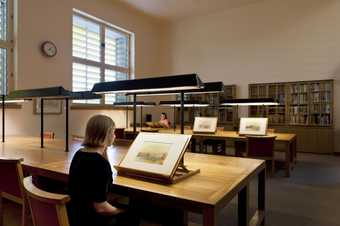 Photograph of visitors viewing watercolours in Tate's Prints and Drawings Room